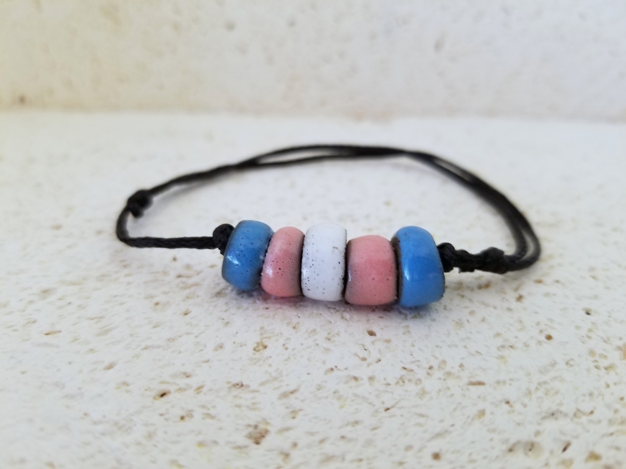 PULSERA TRANS